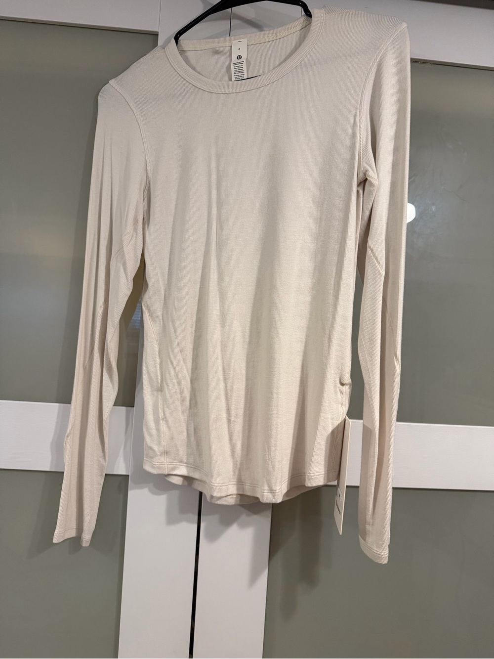 Lululemon Hold Tight Long Sleeve Crewneck Top in light ivory cream color